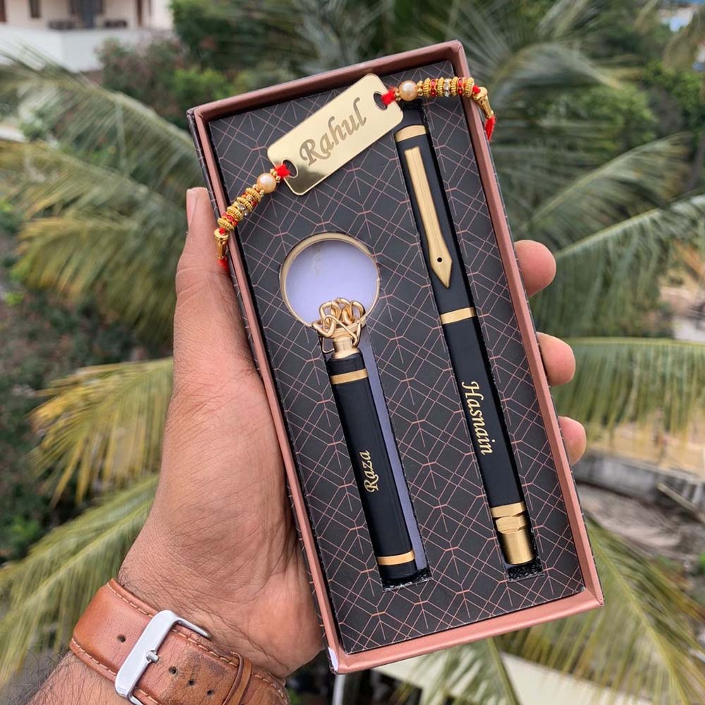 Black Triangle Pen, Keychain & Acrylic Rakhi set